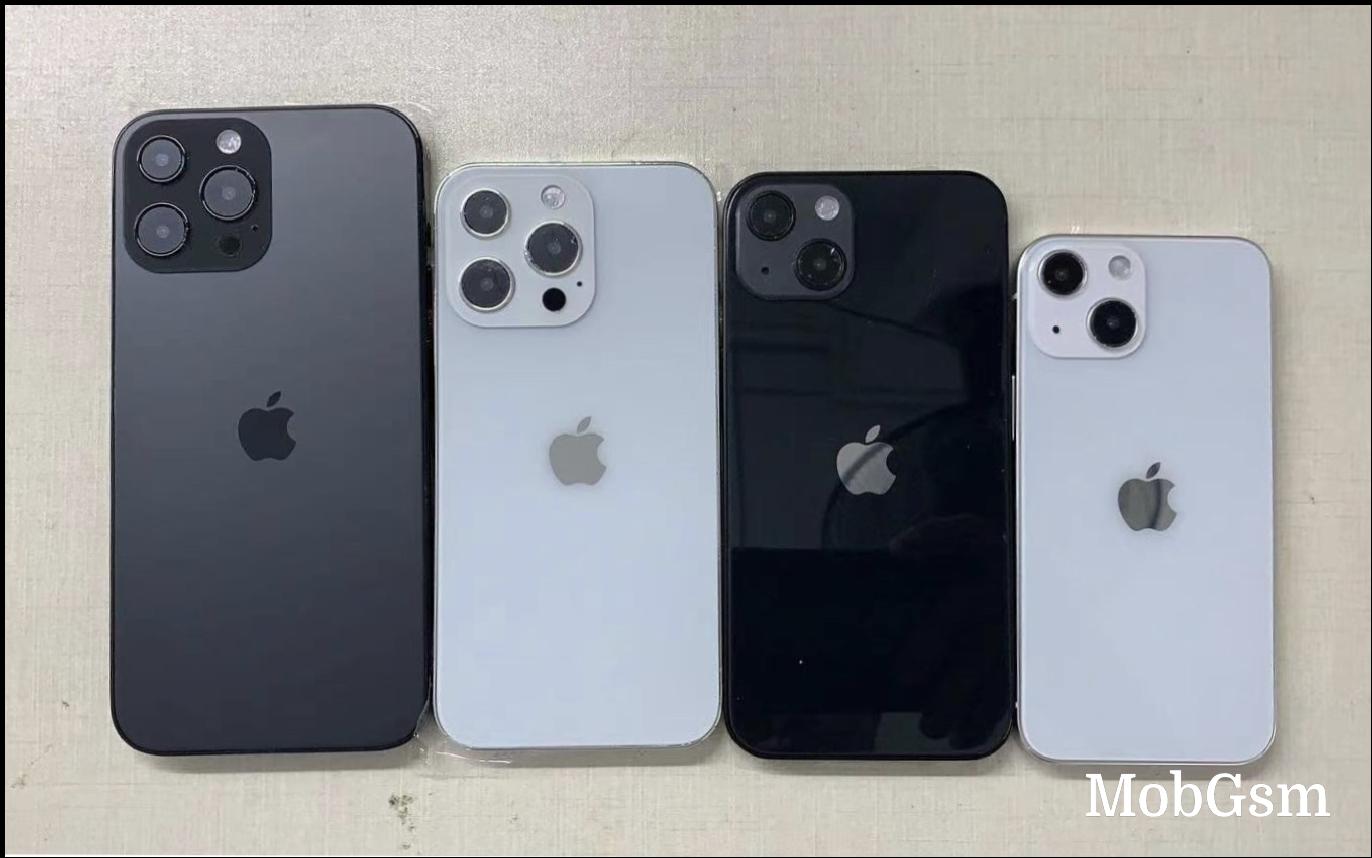 Four iPhone 13 dummies pose for a photo