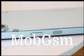 The essential key sits below the power key on the right